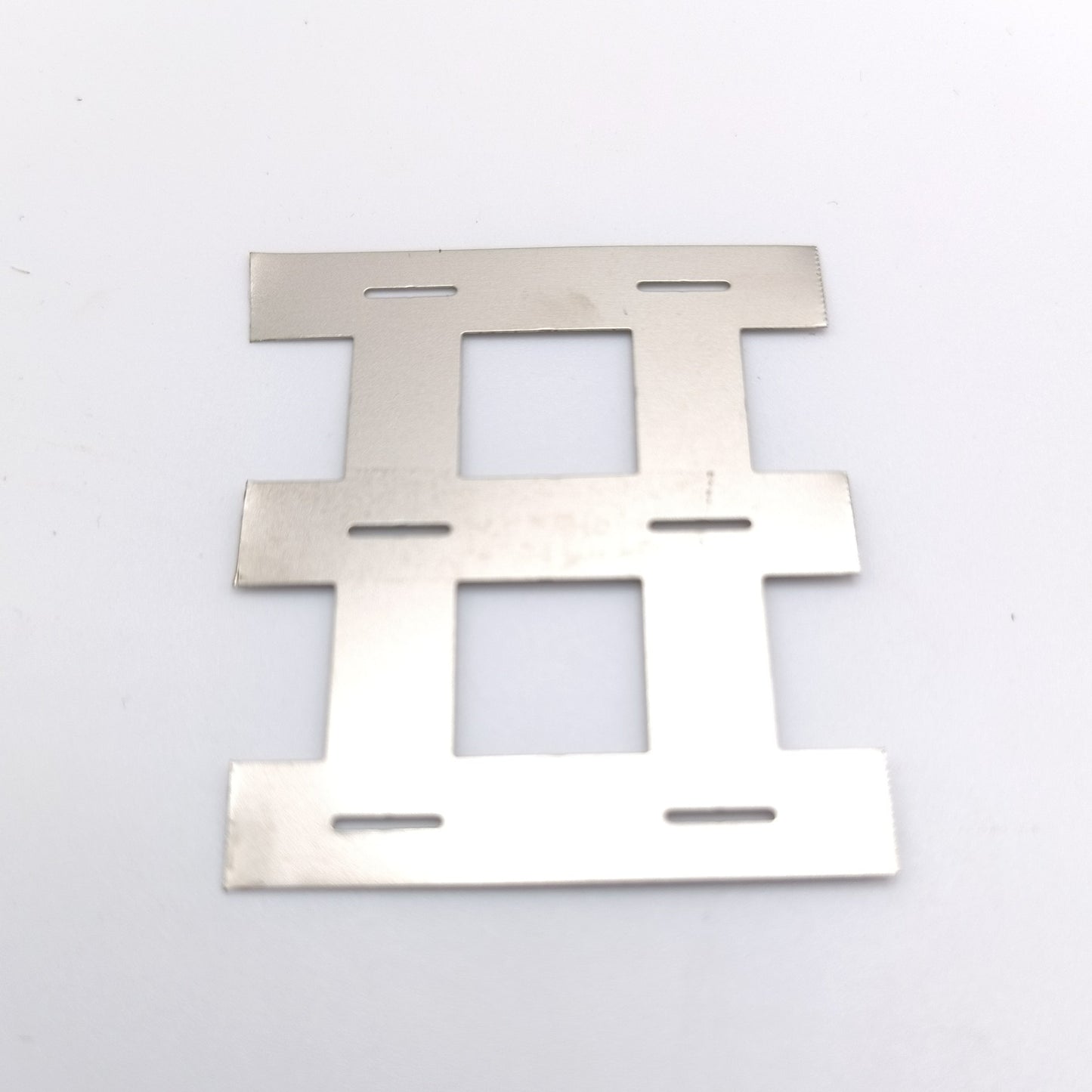 !NEW! Slotted Cell Welding Tabs, 0.2mm Thick, Spaced for Standard Plastic Cell Holders, Per 6 terminals